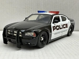 JADA HEAT 2006 DODGE CHARGER R/T POLICE CAR 1:24 DIECAST MODEL NEW NO BOX - Picture 1 of 12