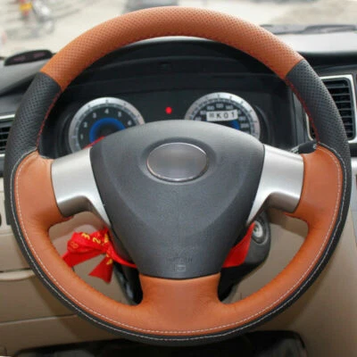 Cubierta envolvente superior de cuero para volante con costura manual para Toyota Corolla Foto 1 de 4