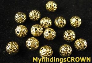 50 pcs Antiqued gold crafted round spacers FC1474