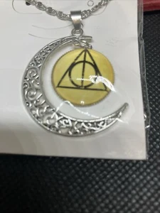 Collar Harry Potter Luna Dije Amarillo Huecos de la Muerte Cristal Plata Collar - Imagen 1 de 2