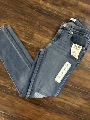 NUEVO CON ETIQUETAS- Jeans elásticos súper ajustados dorados Levi Signature para niñas talla 12 Foto 1 de 4