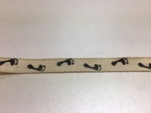 10 yards of Beige Craft Ribbon with foot Prints 1/2"