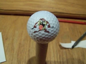 TASMANIAN DEVIL WARNER BROS. GOLF GIFTS & GALLERY    LOGO GOLF  BALL - Picture 1 of 2