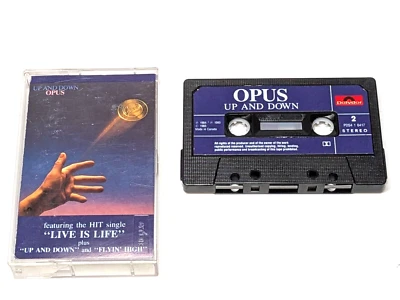 OPUS - UP AND DOWN cassette, 1985 (POLYDOR, CANADA ) featuring LIVE IS LIFE - Image 1 of 4