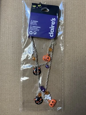 Claire’s Halloween Charm Necklace – Silver Chain with Pumpkin, Ghost, Black Cat  - Image 1 of 3