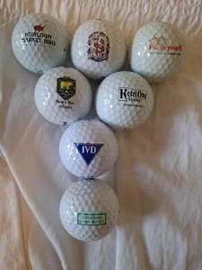 7 Collectible Assorted used logo golf balls - Picture 1 of 1