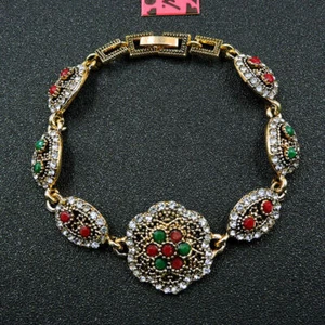 BETSEY JOHNSON ,PULSERA DE ALEACCIÓN DORADO OSCURO CON BRILLO UNICO - Bild 1 von 4