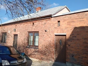 Haus mit Grundstück - Bild 1 von 2