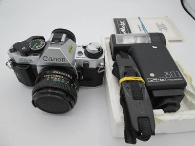 CANON AE-1 PROGRAM IN OTTIME CONDIZIONI + ACCESSORI - Immagine 1 di 4