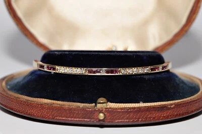 Vintage Circa 1990s 14k Gold Natural Diamond And Caliber Cut Ruby  Bracelet - Image 1 of 4