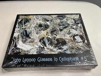 John Lennon Glasses in Cellophane #5 Jigsaw Puzzle by Artist Rob Gratiot - Image 1 of 4
