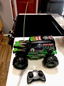 NEW BRIGHT 1/12 scale RC MONSTER JAM GRAVE DIGGER 12” Long Remote Control READ!! - Picture 1 of 10