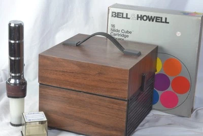BELL & HOWELL SLIDE CUBE PROJECTOR MODEL 981Q with cubes & more..vgc - Image 1 of 4