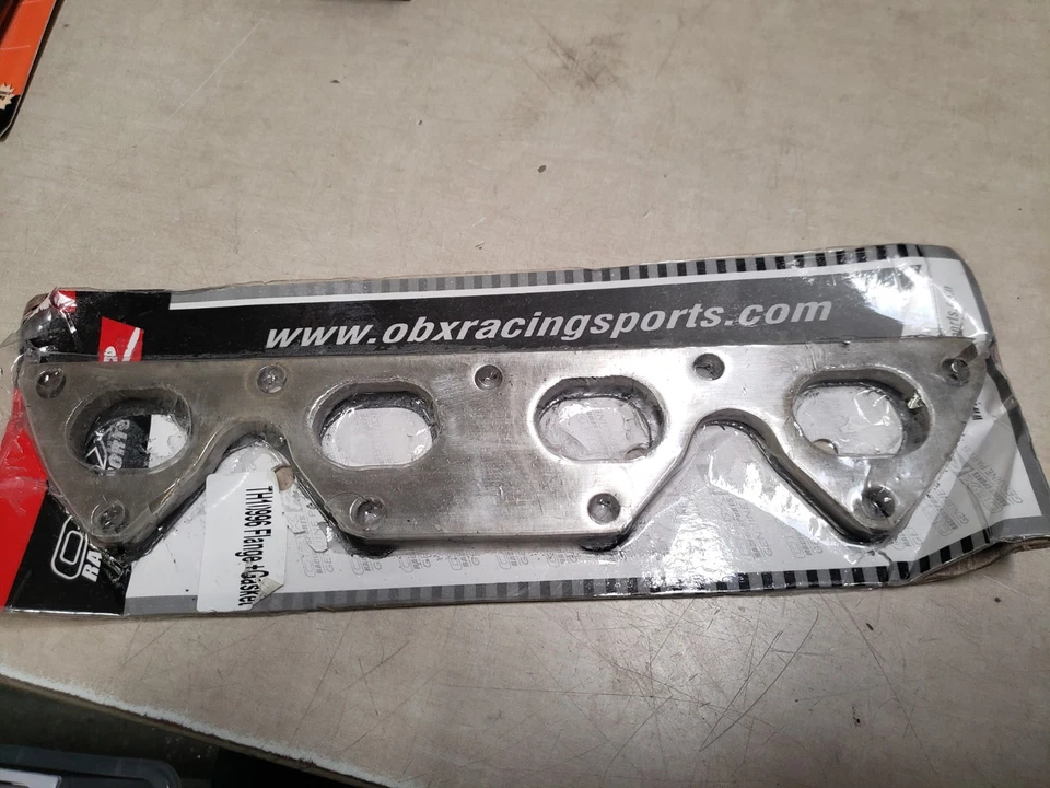 Brida + junta OBX TH10996  Foto 1 de 2