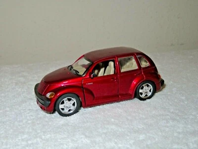CHRYSLER PT CRUISER RED 1:34 SAICO OPENING DOORS &  REAR GATE LIFT - Image 1 of 4