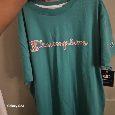 CAMISETA CAMPEONA MUJER TURQUESA TALLA GRANDE NUEVA CON ETIQUETAS CON LOGOTIPO DE CAMPEÓN COLORIDO Foto 1 de 4