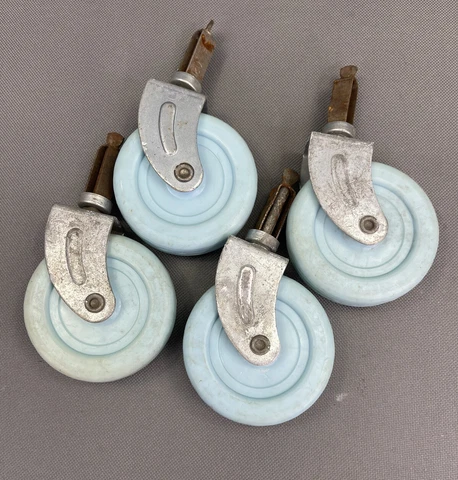4 vintage plastic furniture casters - 1.5” pin & 2.75" diameter blue  wheels Cover