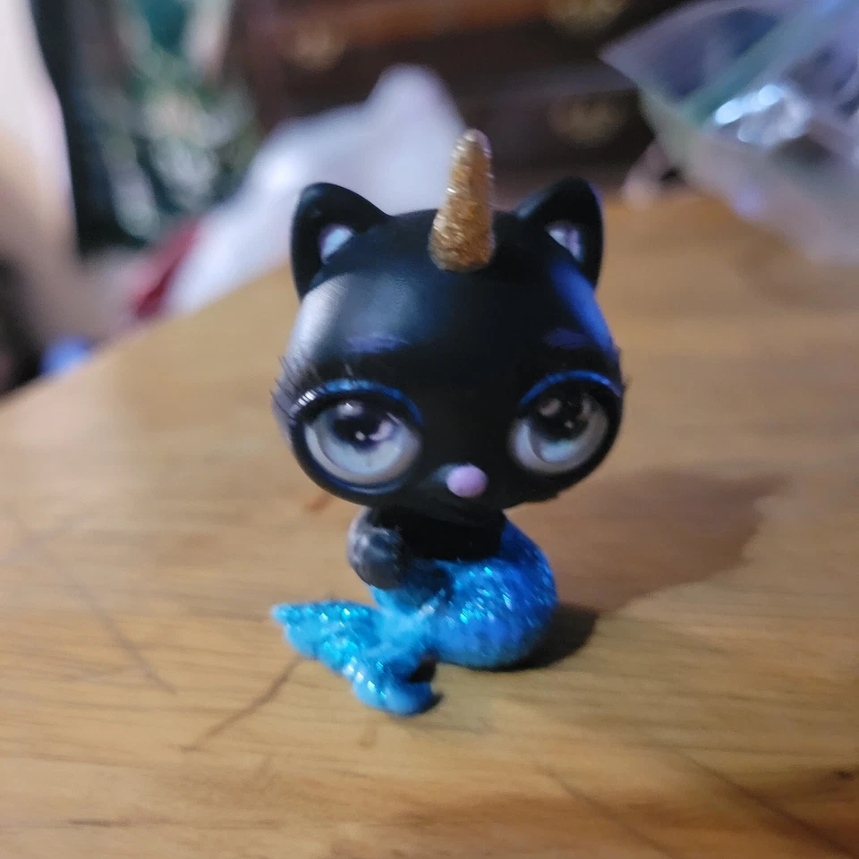 Poopsie Cutie Tooties SPLASH Sirena Gatito Negro Unicornio Pestañas Enraizadas Figura Juguete Foto 1 de 2