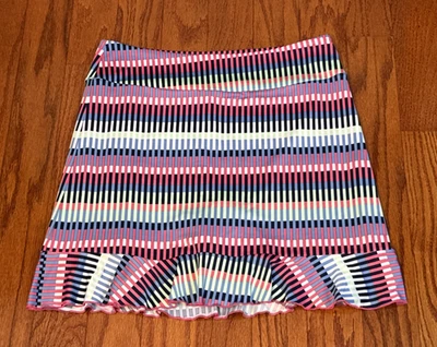 Falda corta deportiva Golftini mediana Tutti Frutti con bolsillos cortos elásticos Foto 1 de 4