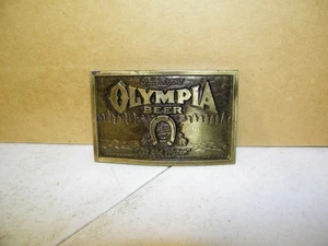 1974 Vintage Olympia Beer It's The Water Belt Buckle Brass USA Lewis Buckles - Picture 1 of 2