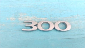 05 06 07 08 09 10 CHRYSLER 300 REAR LID EMBLEM LOGO BADGE SYMBOL USED OEM  - Picture 1 of 3