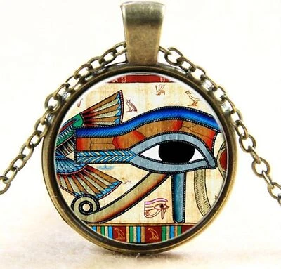 Awaken Your Kundalini Egyptian Eye of Horus Pattern Flat Round Glass Pendant - Image 1 of 2