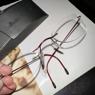 SILHOUETTE 6670 40 6066 7799 Burgundy Womens Oval Eyeglasses 46-19-140 - Image 1 of 4