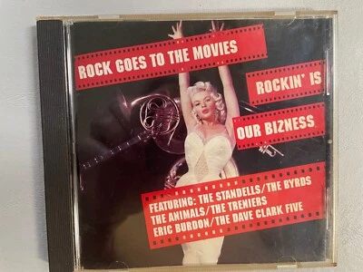 ROCK GOES TO THE MOVIES/ROCKIN' IS OUR BIZNESS (1992) DISC & INSERTS ARE N. MINT — 第 1/3 张图片