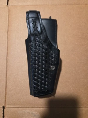 LOTE USADO de armas de fuego y fundas Taser de policía.  PAQUETE TODO USADO Foto 1 de 4