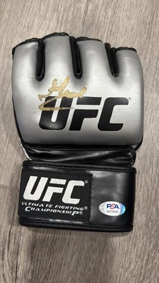 ISLAM MAKHACHEV SIGNED UFC MMA GLOVE PSA COA DOUBLE CHAMPION - Image 1 of 4