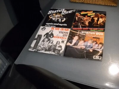 STATUS QUO: (4 vinyles 45 tours de la belle époque du groupe Statusquo). - Photo 1/4