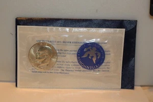 1974 S Eisenhower Silver Dollar in Cellophane / Blue Envelope and COA.. - Picture 1 of 4