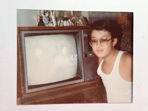 BOY WITH TELEVISION SET SHOWING ASIAN PROGRAM Original Color Photo - Picture 1 of 2