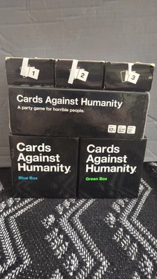 Cards Against Humanity Base Game + 1st, 2nd, 3rd Expansions + Blue & Green Box L - Image 1 of 4