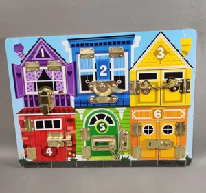 Melissa & Doug Lernen - Riegel, Schnalle, Haken, Zahlen & Farben Aktivitätstafel - Bild 1 von 15