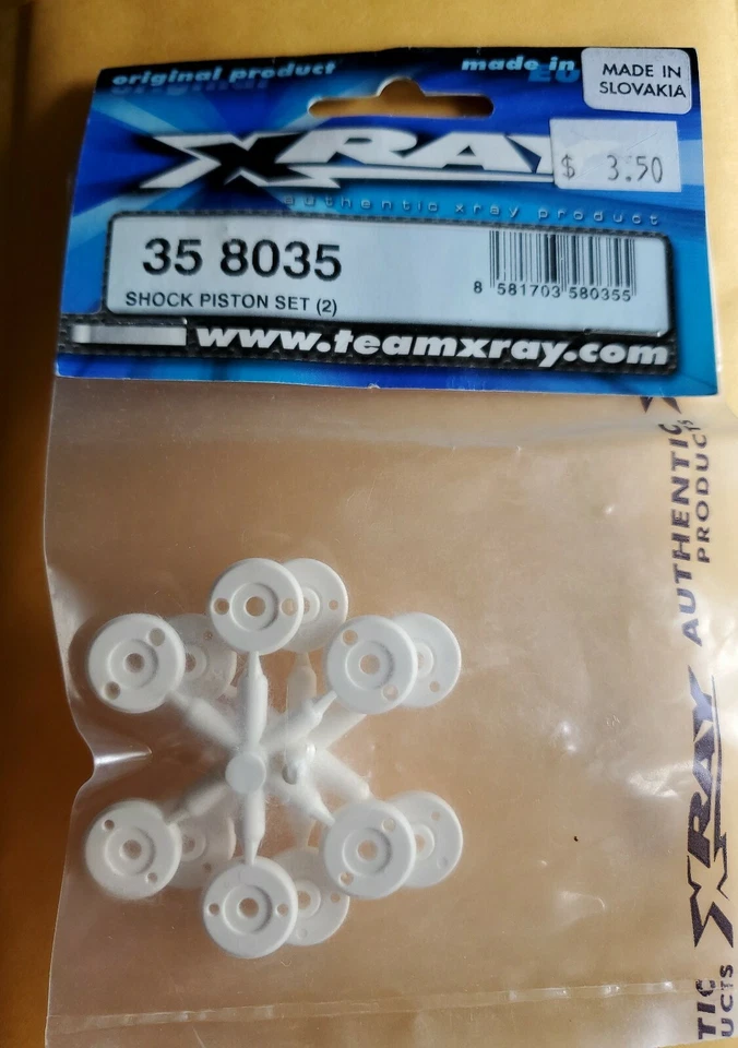 XRAY SHOCK PISTON SET 2  358035 - Image 1 of 1