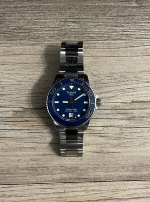 Reloj unisex Tissot Seastar 1000 cuarzo esfera azul 36 mm T1202101104100 Foto 1 de 4