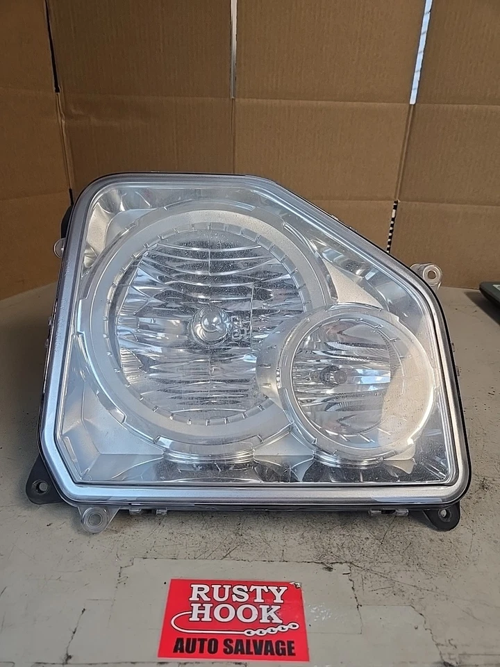 2010 JEEP LIBERTY Driver Headlight Chrome Bezel 51128C Foto 1 de 4