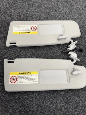 2004-2010 Volkswagen Beetle  Left and Right Sun Visor  gray with holders - Image 1 of 4