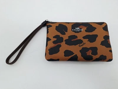 Muñequera Coach marrón negro leopardo esquina cremallera o Foto 1 de 4