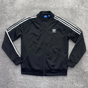 Adidas Trainingsjacke Damen Large schwarz SST Superstar Trefoil Zip gefüttert BK5931 - Bild 1 von 14