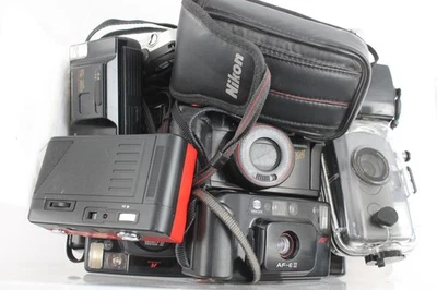 Lote de trabajo surtido de cámaras de película compactas de 35 mm para apuntar y disparar vintage con algunos estuches Foto 1 de 4