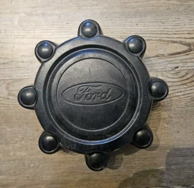 1999-2004 Ford Excursion F250 f350 SD Black OEM Center Cap  - Image 1 of 4