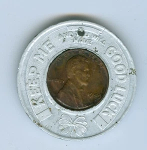 ENCASED BY WM. VOLCKER AND CO OF OMAHA NEBRASKA A 1949 LINCOLN CENT - Picture 1 of 2