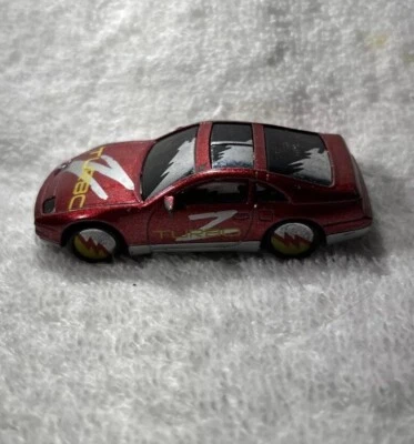 VTG 1990 Match Box Mattel #61 Nissan 300XZ Red/Silver Foil Made In China - Image 1 of 4