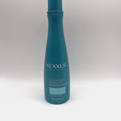 Nexxus Acondicionador Ultraligero Suave Protección Contra el Frizz Sin Peso 13.5oz 1 Paquete Foto 1 de 4