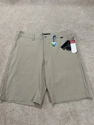 Pantalones Cortos Travis Mathew Hombres 34 Tostado Caqui Golf Chino Rendimiento Elástico Informal Cuello Foto 1 de 4