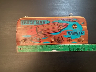 Small Vintage Wooden Space Man Coat Hanger Helmet Gun Suit Deere Cedarcraft - Image 1 of 4