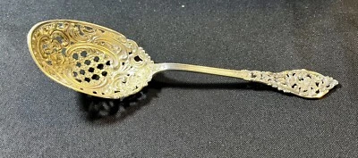 Cuchara perforada de plata de ley Dominick Haff Trianon 1887 64 gr.  Lavado en oro. ML Foto 1 de 4