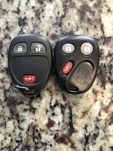 2 ORIGINAL GM 06-13 OEM KEY LESS ENTRY FOB TRUCK - Picture 1 of 2
